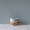Single handmade mug in blue, brown and grey by Palinopsia Ceramics