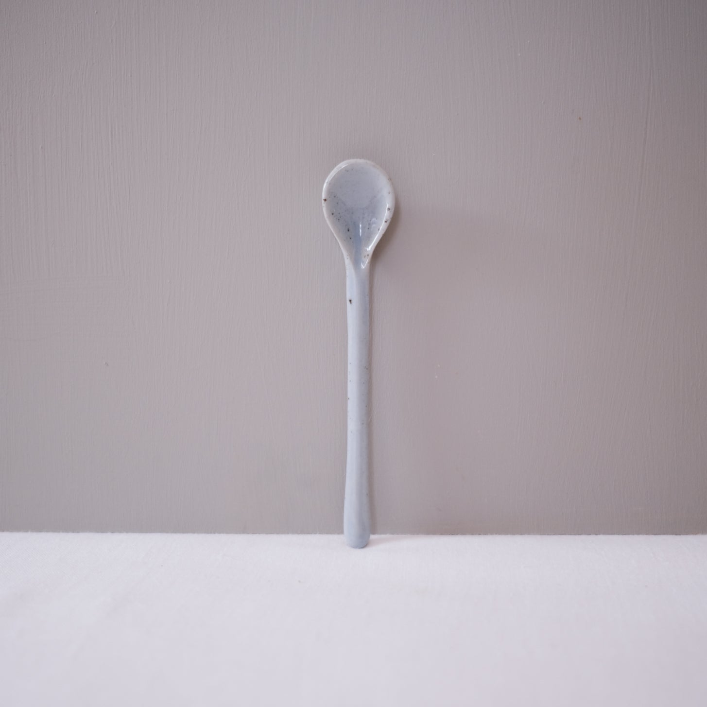 Handmade teaspoon in blue speckle by Palinopsia Ceramics 