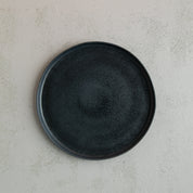 Birdseye view of a handmade Black dinner plate by Palinopsia Ceramics in Sydney Australia 