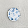 Bird's-eye view of a handmade lunch plate by Palinopsia Ceramics in a blue and white design
