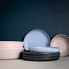 Palinopsia Ceramics displays their stack of Handmade dinner set in block colours hand made in Portugal 
