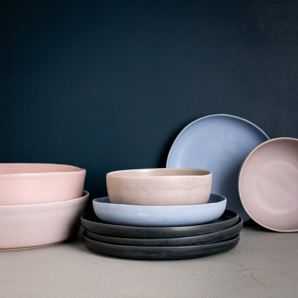 Handmade dinnerware set by Palinopsia Ceramics in block colours of ink black, baby blue and powder greys