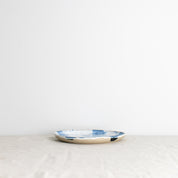 Side view of a handmade Pollock lunch plate 