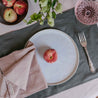 Romantic table setting with white dinnerware set made in Portugal