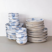 Handmade dinner set in blue and white for 10 people by Palinopsia Ceramics  